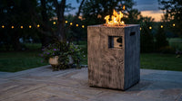Outdoor Propane Fire Pit, 30000 BTU Column Propane Fire Pit, Wood-Look Surface — Lifestyle